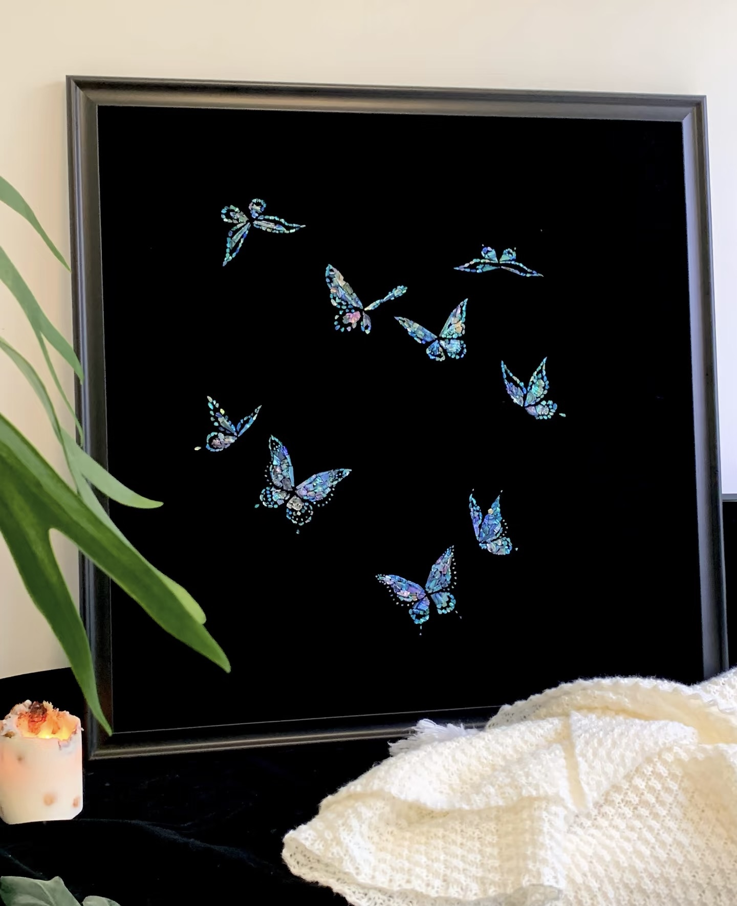 Crafted from luminous nacre, this artwork captures a fleeting moment of delicate transformation. A circle of butterflies—glowing with iridescent blues, greens, and purples—seems to dance in silent harmony, their wings shimmering like fragments of moonlight. The nacre’s natural texture gives each butterfly a unique soul, evoking feelings of peace, rebirth, and graceful motion suspended in time.
